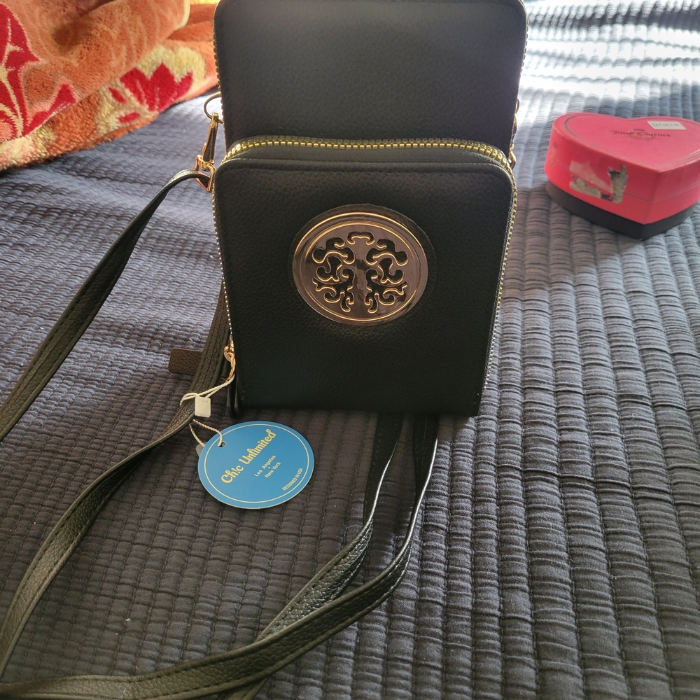 Chic Black Crossbody Bag with Gold Emblem